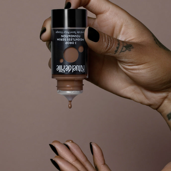 Rituel de Fille-3 Drop Weightless Serum Foundation-Makeup-DROP-185hand1square-The Detox Market | Potion 185 - Medium deep shade for warm olive undertones