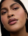 Wonderblush-La Laque Tinted Lip Oil-Makeup-LaLaque-ModelDarkSkin-Geranium_c8e7a3c3-a5f2-4042-a3df-080b522af2ea-The Detox Market | 