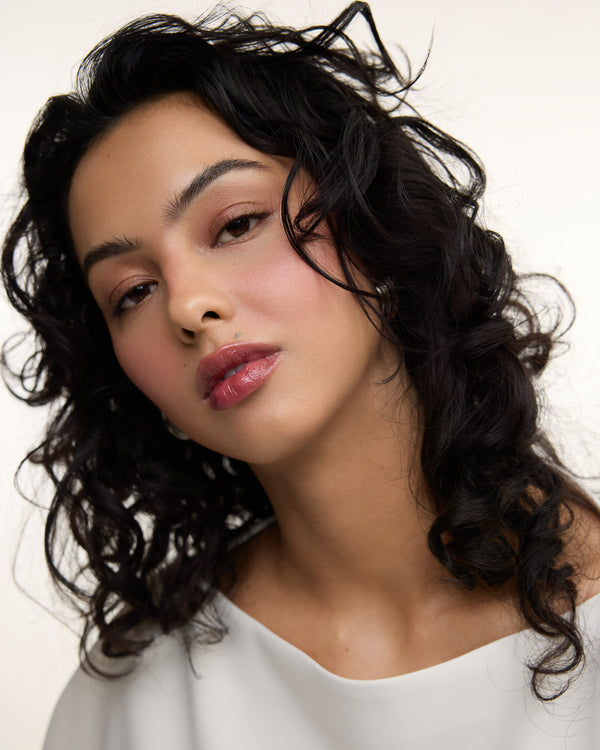 Wonderblush-La Laque Tinted Lip Oil-Makeup-LaLaque-ModelMediumSkin-Bordeaux-The Detox Market | 