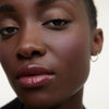 Wonderblush-La Lumière Liquid Eye Shadow-Makeup-LaLumiere-ModelDarkSkin-Bronze-The Detox Market | Bronze - Rich bronze